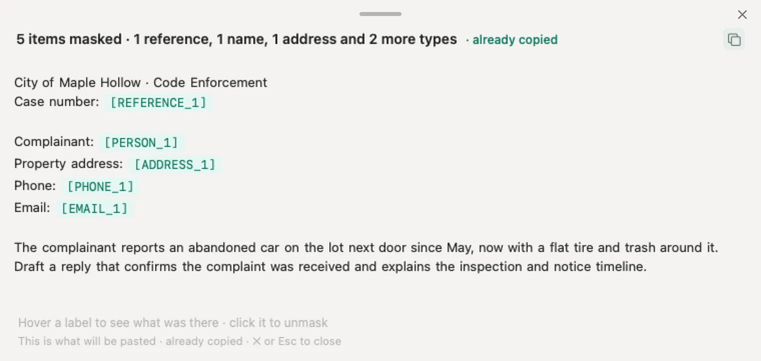 ChatGPT for local government with Nonimo: an invented code enforcement complaint with the complainant's name, property address, phone, email and case number masked, and the city's name still readable
